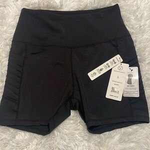 Vogo Athletica,Women’s Shorts with pockets, Size L Color Black